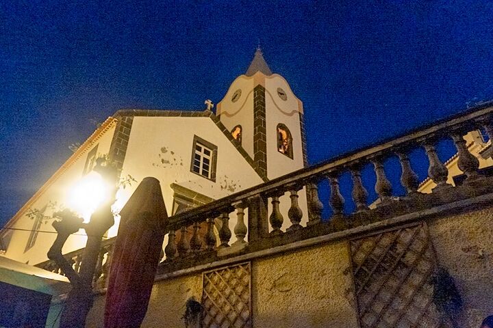 Lit church tower at night