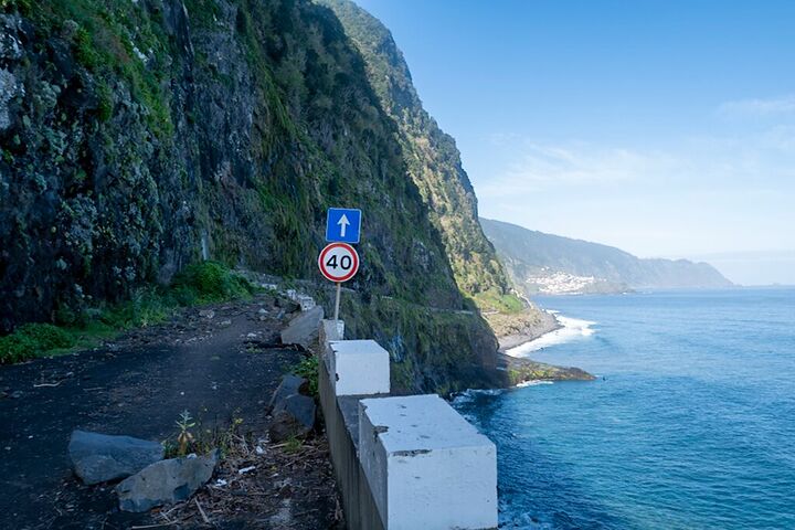 A coastal road cut into sea cliffs