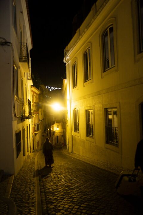 Lamplit alley at night